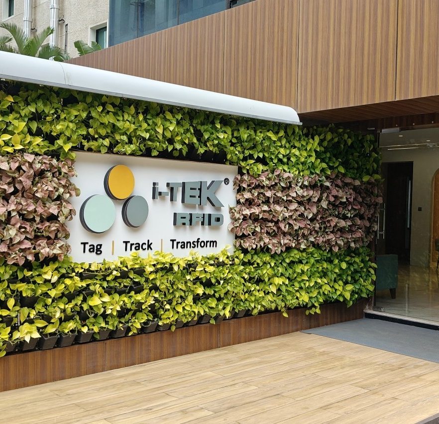 i-TEK RFID office reception in Pune with Tag Track Transform signage